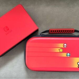 Nintendo Switch OLED with case and games